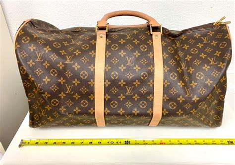 lv duffle bag fake|knockoff louis vuitton duffle bags.